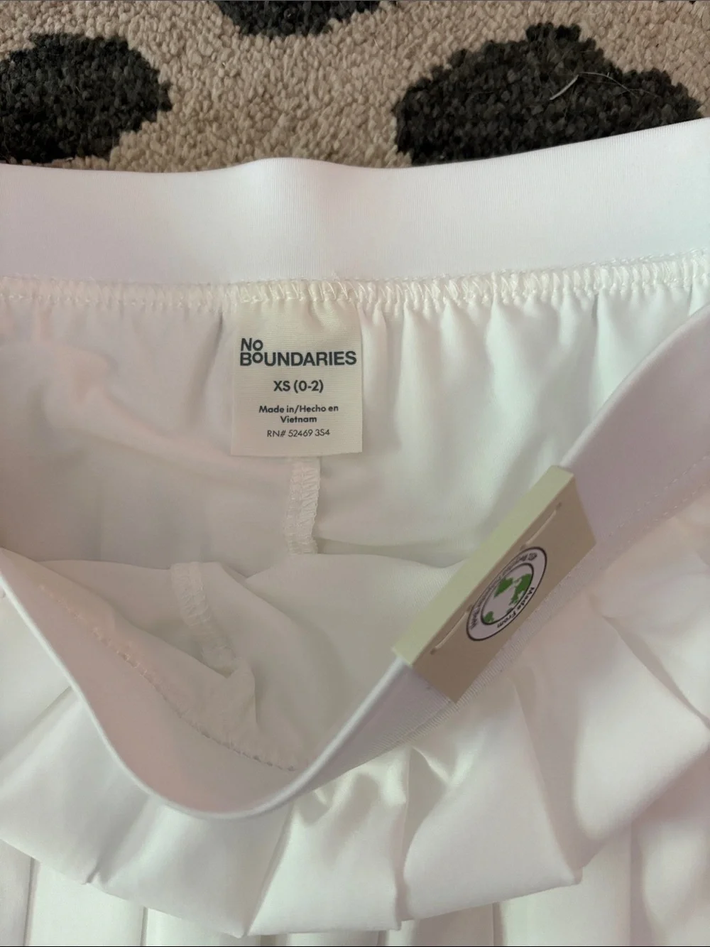 No Boundaries White Pleated Mini Skirt